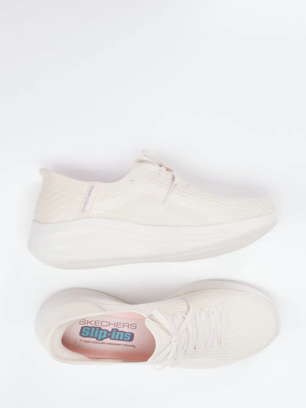 Skechers – Slip-On Sneaker aus Textil in Cremeweiß