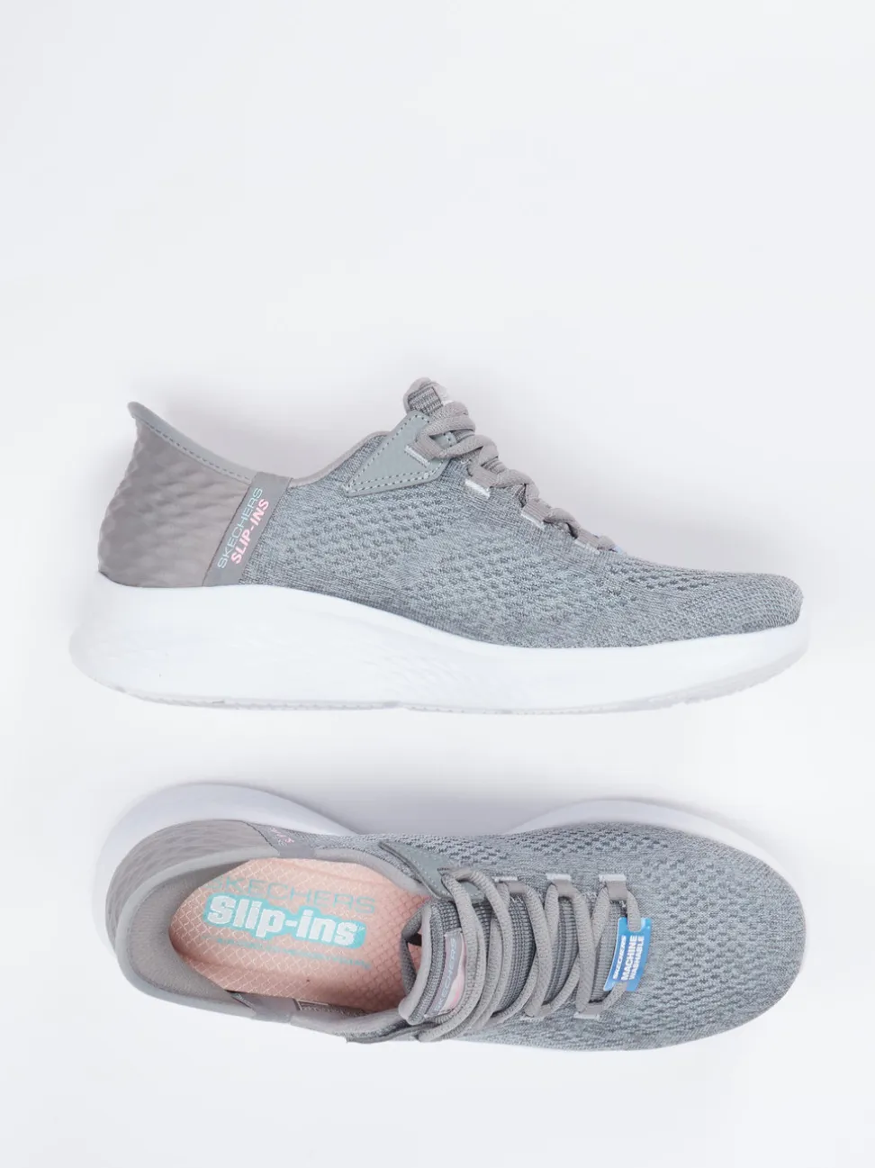Skechers – Slip-On Sneaker aus Textil Grau