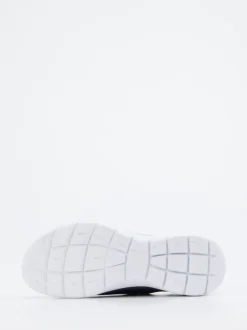 Skechers – Slip-On Sneaker aus Textil in Dunkelblau