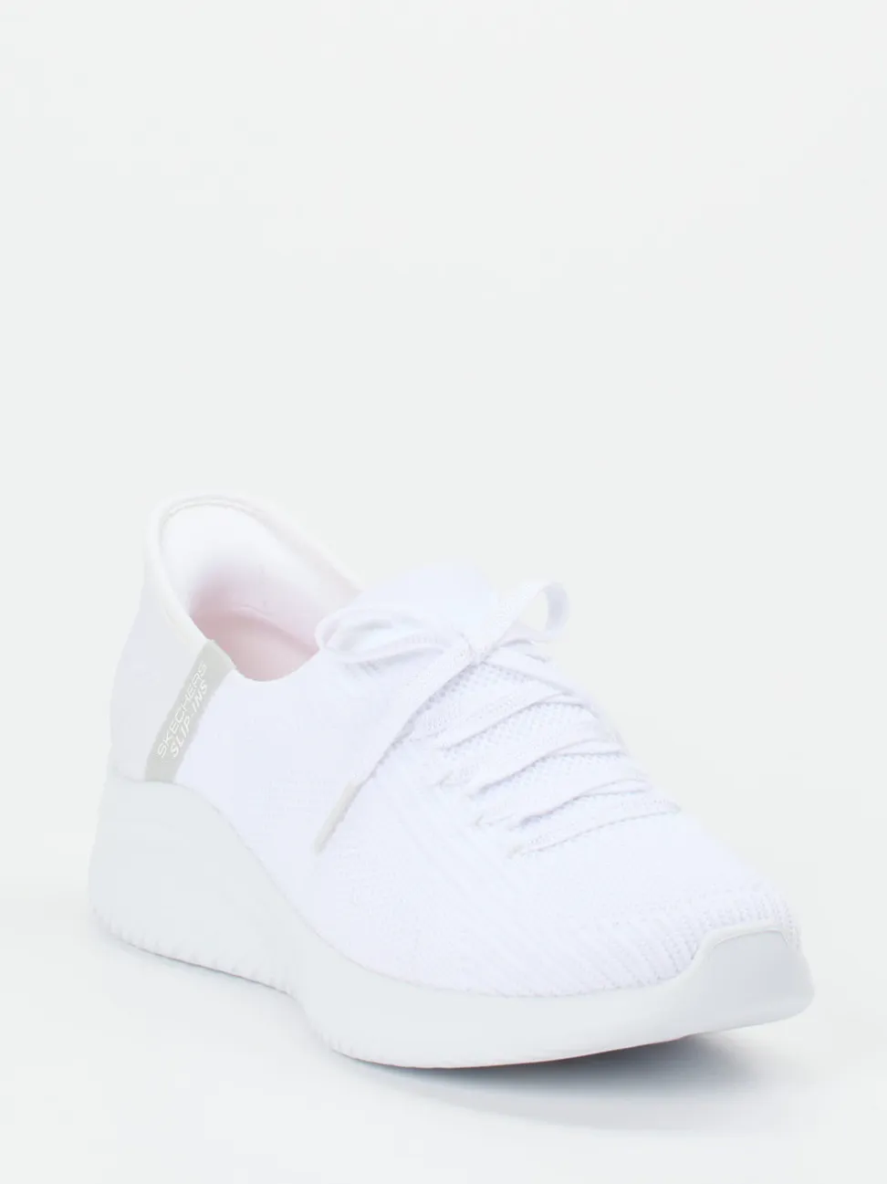 Skechers – Slip-On Sneaker aus Textil in Weiß
