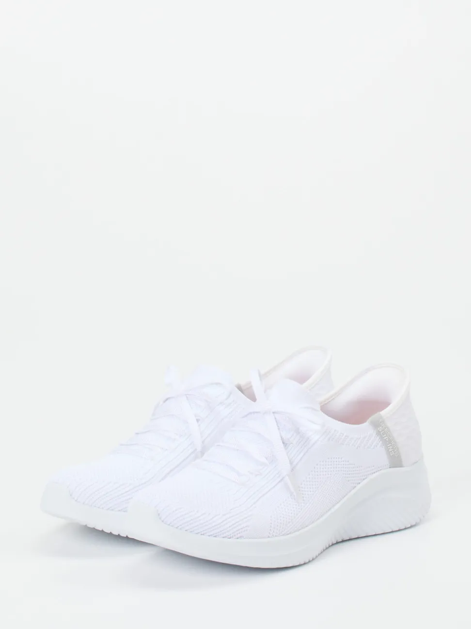 Skechers – Slip-On Sneaker aus Textil in Weiß