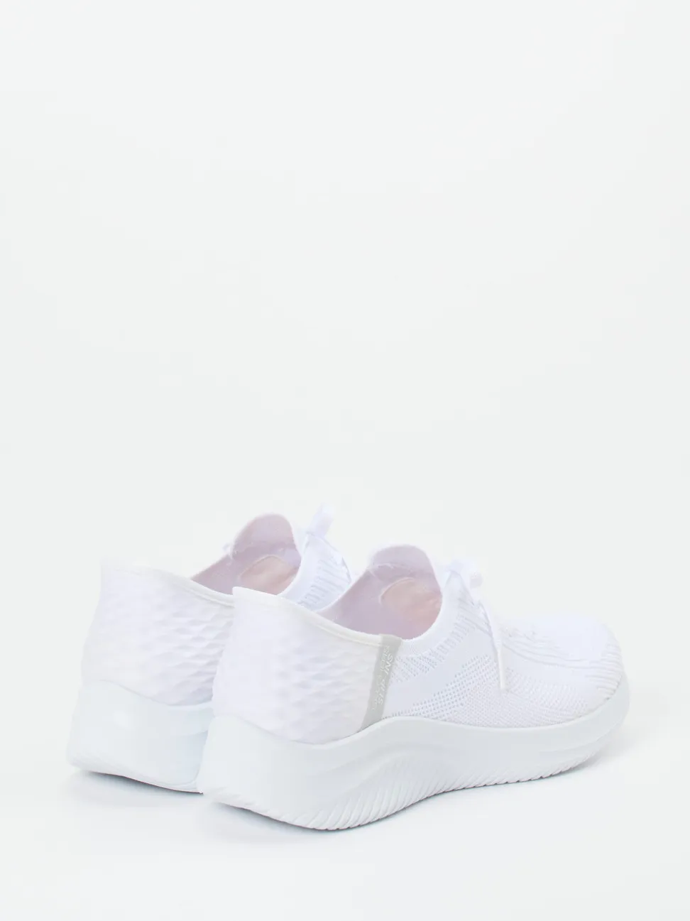 Skechers – Slip-On Sneaker aus Textil in Weiß