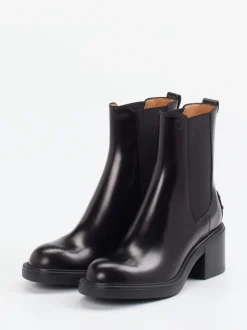 Tod's – Chelsea Boots aus Hochglanzleder Schwarz