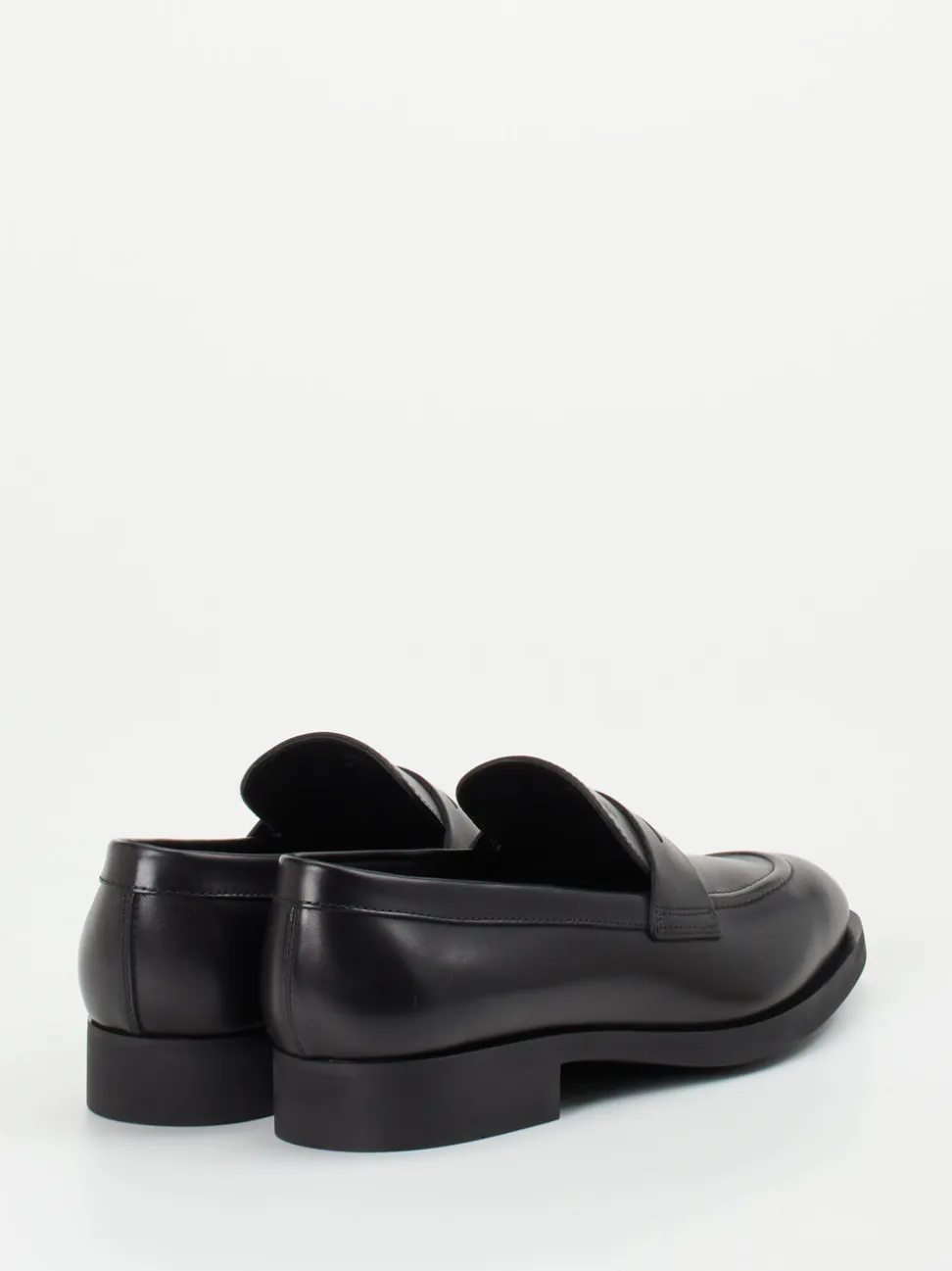 Tod's – Penny Loafer aus Kalbleder in Schwarz