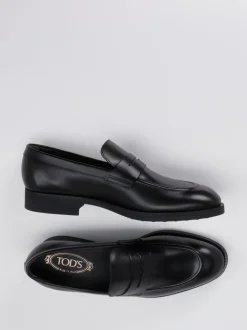 Tod's – Penny Loafer aus Kalbleder in Schwarz