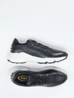Tod's – Sneaker aus Kalbleder in Schwarz-Weiß