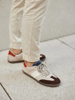 Tod's – Sneaker aus Veloursleder in Beige