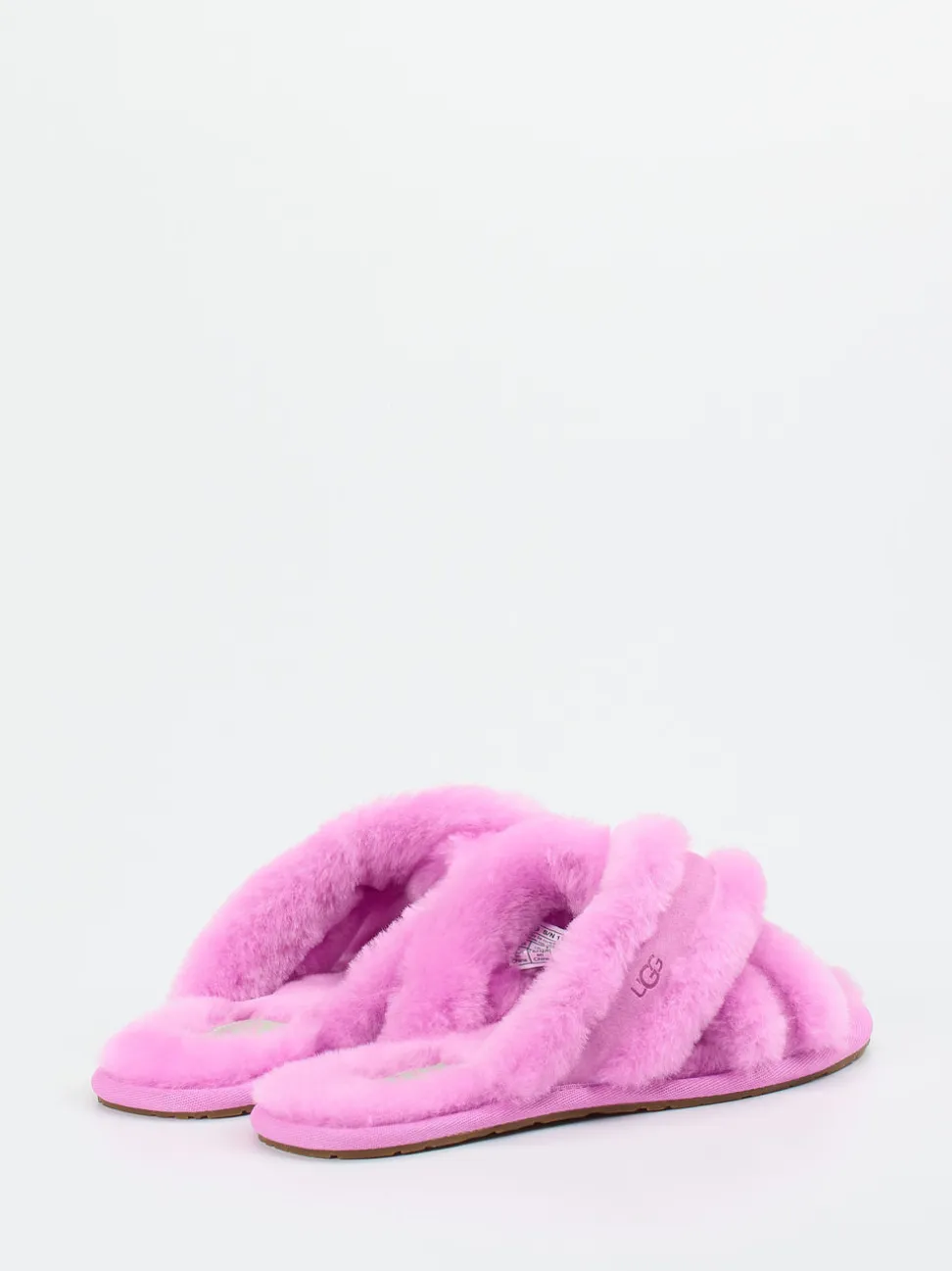 UGG – Fell-Pantoletten aus Lammfell in Pink
