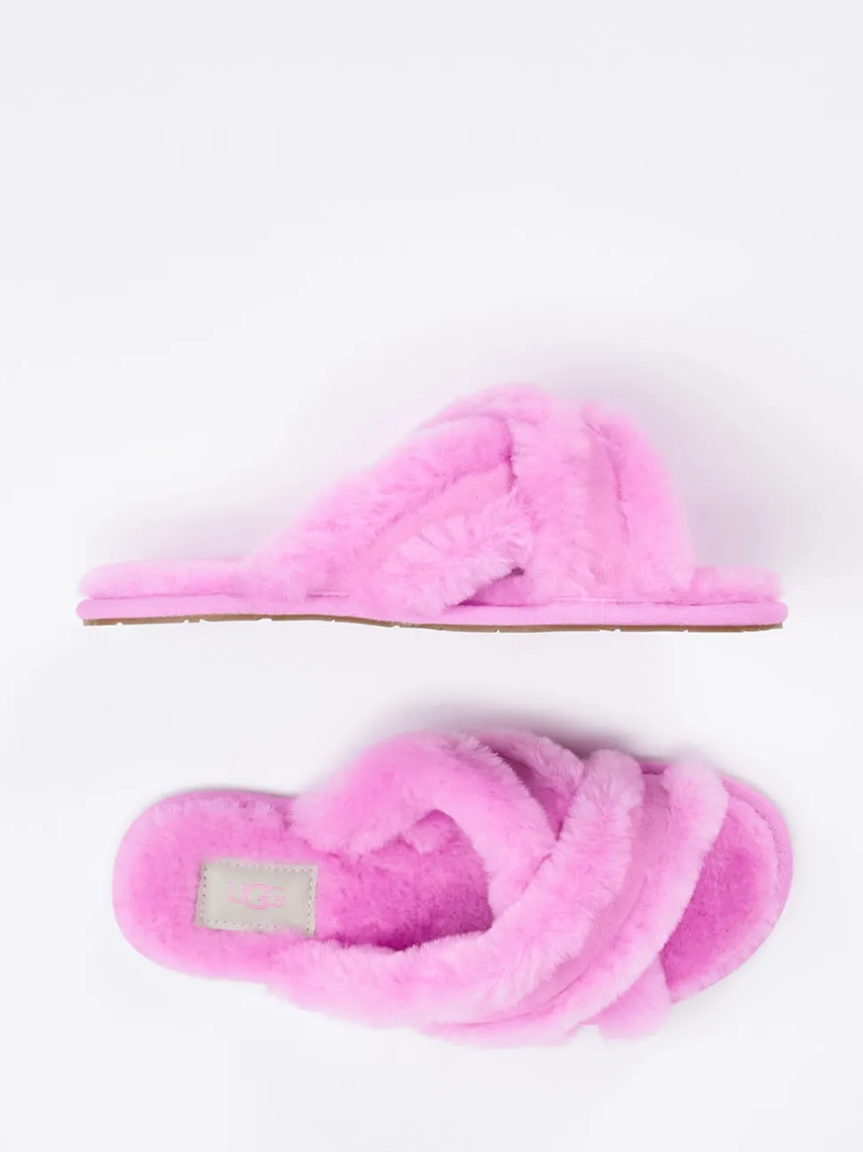 UGG – Fell-Pantoletten aus Lammfell in Pink
