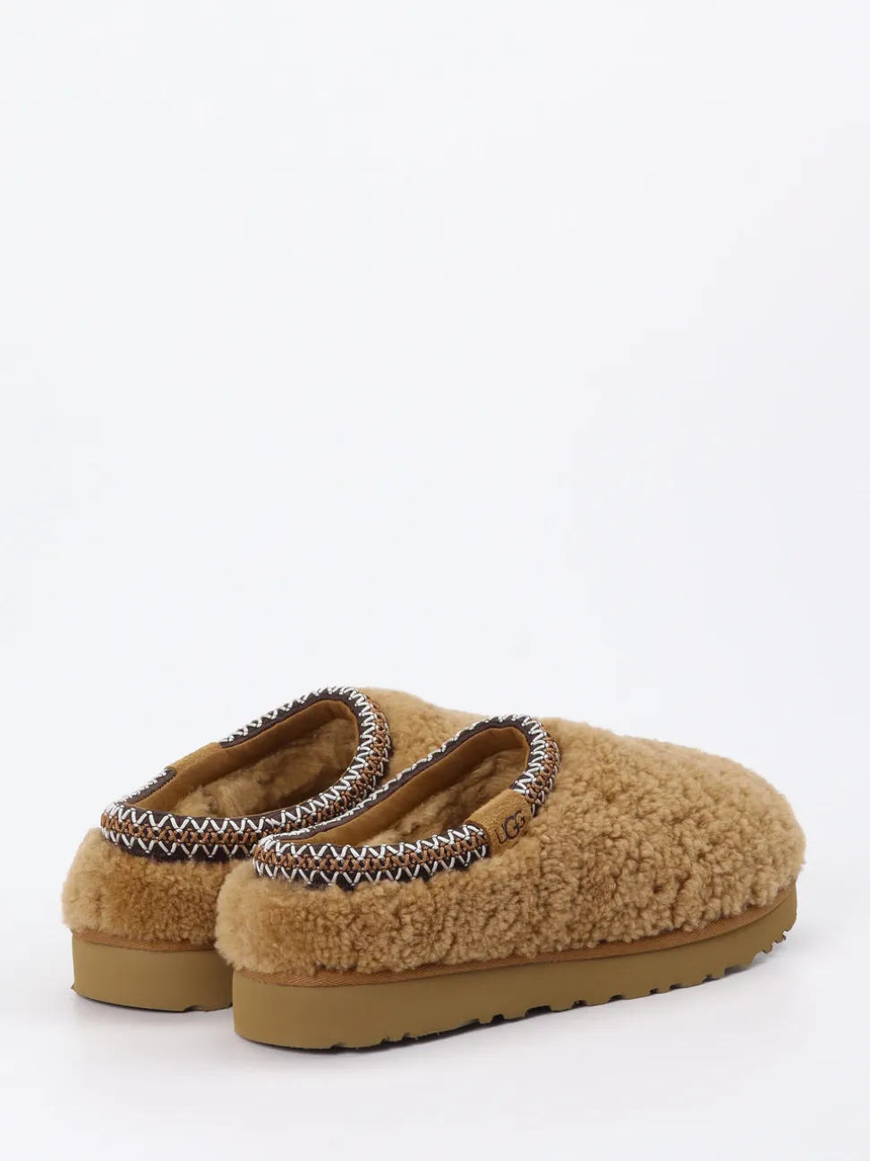 UGG – Fell-Pantoletten aus Lammfell karamellbraun