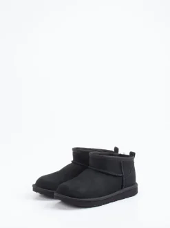 UGG – Lammfell-Boots aus Veloursleder schwarz
