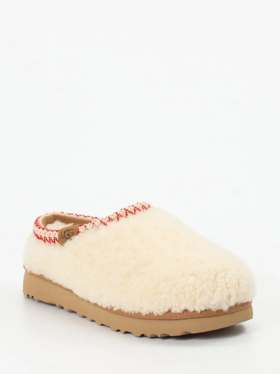 UGG – Lammfell-Clogs aus Fell in Cremeweiß