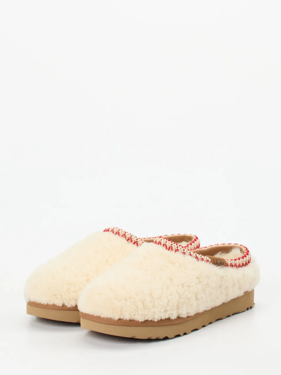 UGG – Lammfell-Clogs aus Fell in Cremeweiß