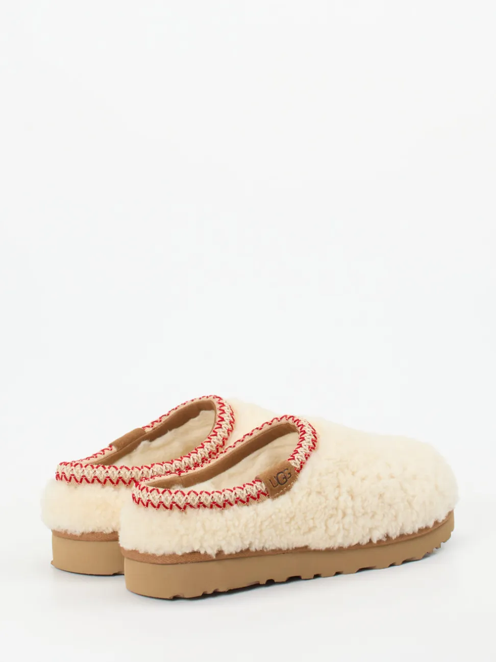 UGG – Lammfell-Clogs aus Fell in Cremeweiß