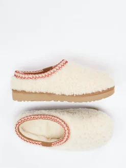UGG – Lammfell-Clogs aus Fell in Cremeweiß