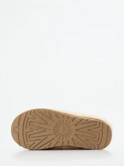 UGG – Lammfell-Clogs aus Fell in Cremeweiß