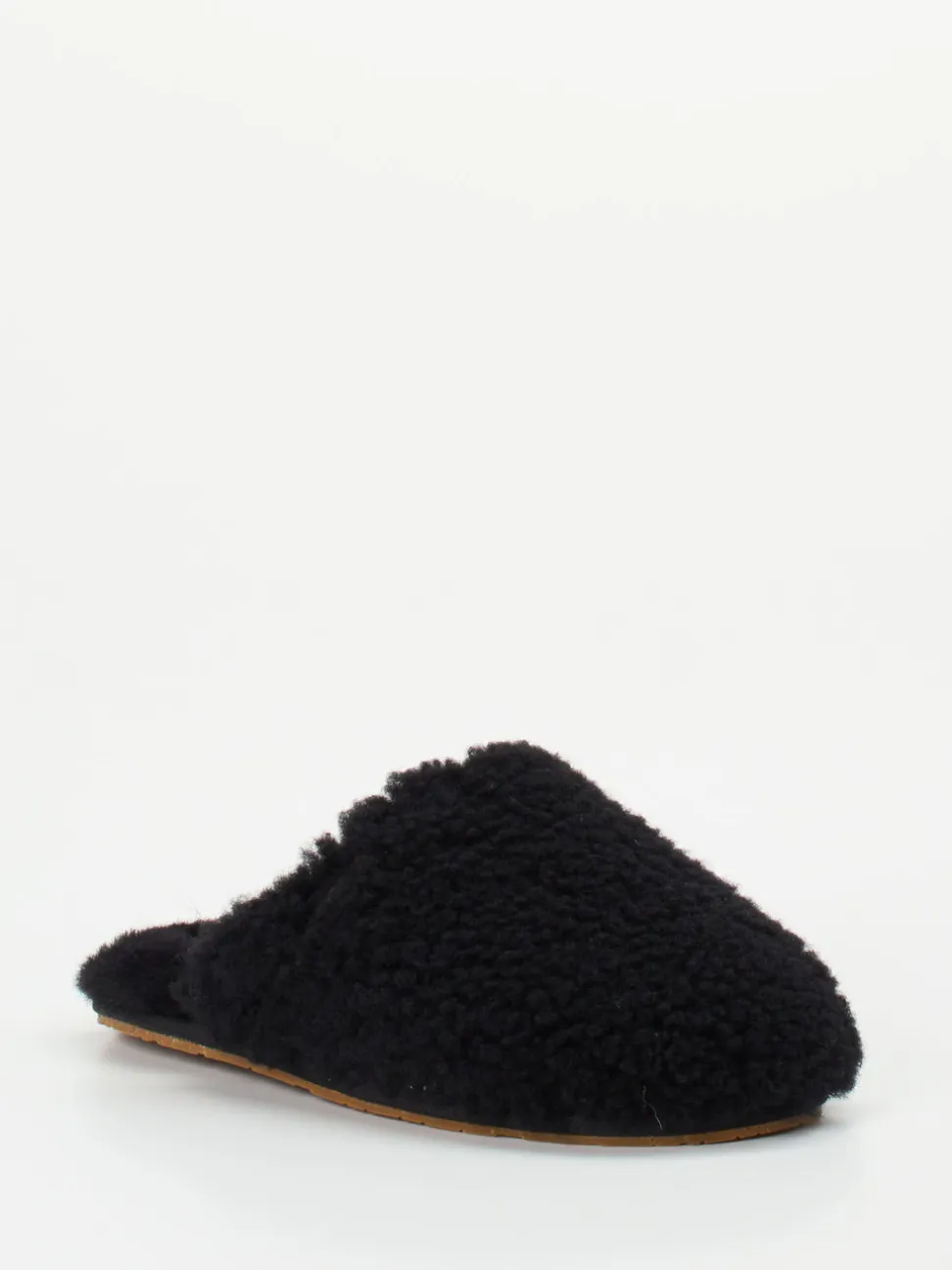 UGG – Pantoffeln aus Fell in Schwarz