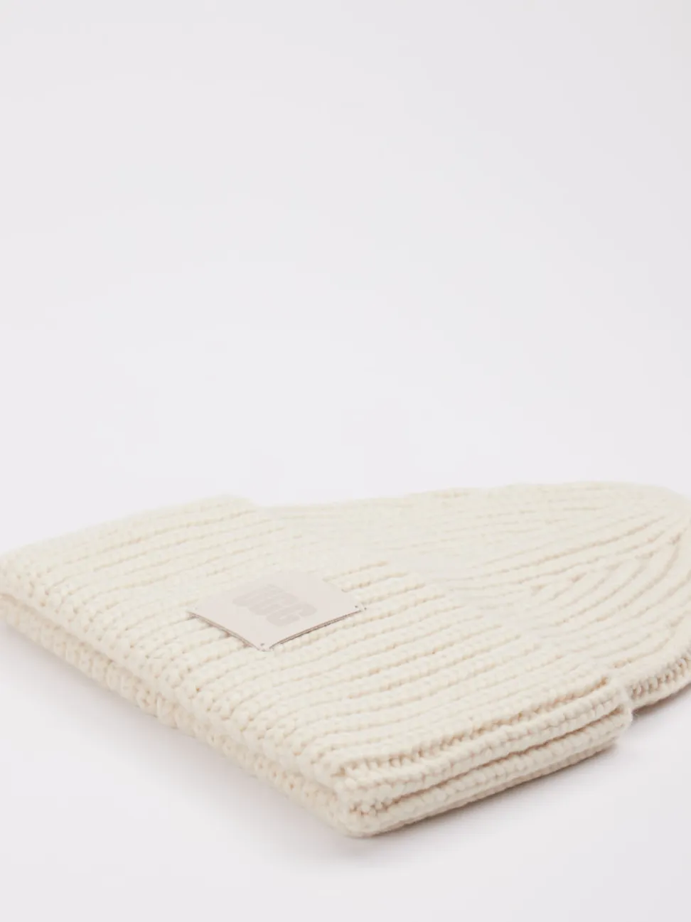 UGG – Strickmütze aus Textil in Cremeweiß