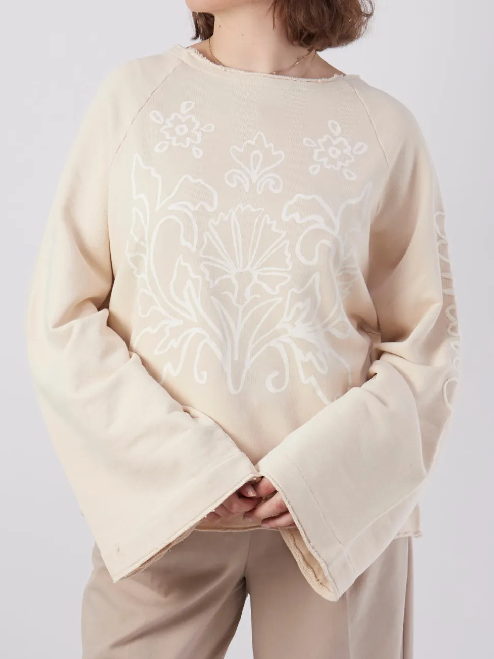 Yippie Hippie – Sweatshirt aus Baumwolle in Creme